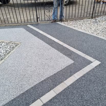Freshly installed resin bound driveway with light aggregate blend in Central Scotland